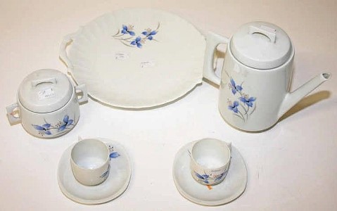 AN ATTRACTIVE THIRTY NINE PIECE LIMOGES PORCELAIN COFFEE SERVICE, 
with plates, coffee cups,