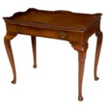 A 19TH CENTURY MAHOGANY OR RED WALNUT SILVER TABLE, 
the rectangular top with a shaped gallery,