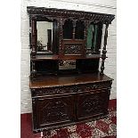 A LARGE CARVED OAK MIRROR BACK CHIFFONIER,