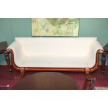 A REGENCY STYLE MAHOGANY AND PARCEL GILT DOUBLE SIDED SETTEE, 
O.R.M.