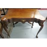 A FOLDOVER MAHOGANY TEA TABLE, 
George II period and later, adapted,