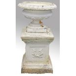 AN ATTRACTIVE TERRACOTTA GARDEN URN, 
with egg and dart moulded rim, on stem base,