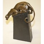 AN ART DECO STYLE BRONZE FIGURE OF A CHEETAH, 
on rectangular upward tapering plinth, 13.5in (35cm).