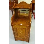 AN INLAID ROSEWOOD PURDONIUM,
with shelf and mirror back, above an inlaid panel door, adapted,