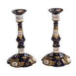 A VERY ATTRACTIVE PAIR OF DARK BLUE ENAMEL CANDLE STICKS, possibly Staffordshire,