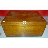 A 19TH CENTURY IRISH OAK LIFT TOP CHEST, 
by Strahan company of Dublin, stamped,