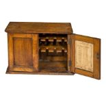 AN EARLY 20TH CENTURY OAK TABLE CUPBOARD,