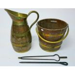 A BRASS BOUND OAK PEAT BUCKET, with swing handle, 12in (30cm); and a large matching ewer, 18.