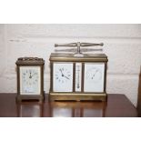 AN UNUSUAL BRASS CARRIAGE CLOCK/BAROMETER/THERMOMETER AND COMPASS,