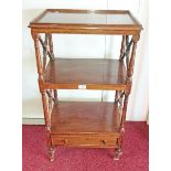 A THREE TIER MAHOGANY WHAT NOT, 
O.R.M., with base drawer and turned supports, 35.5in (90cm)h x 19.