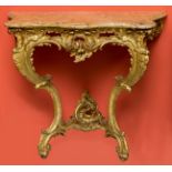 A FINE PAIR OF 19TH CENTURY CARVED GILTWOOD AND SERPENTINE SHAPED CONSOLE TABLES,