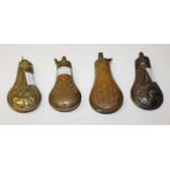 THREE EMBOSSED COPPER PISTOL POWDER FLASKS, 
19th century and another similar brass ditto,