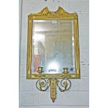 A GILT GIRANDOLE WITH BEVELLED MIRROR PLATE, 
in a flower and bead moulded frame,