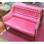 AN EDWARDIAN INLAID MAHOGANY BUTTON BACK SETTEE,