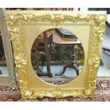 A 19TH CENTURY CARVED GILT WOOD PICTURE FRAME, 
the oval centre with sand gilt cornice,