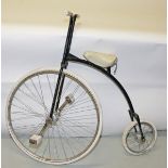 A CHILDS PAINTED PENNY FARTHING BICYCLE, 
probably c. 1920's/'30's.