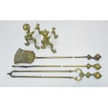 A SET OF THREE MODERN BRASS FIRE IRONS,