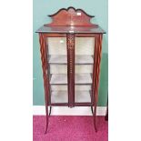 A SMALL NARROW EDWARDIAN PAINTED DISPLAY CABINET, 
the bow fronted  centre and a single glazed door,