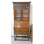 AN ART NOUVEAU OAK BUREAU BOOKCASE,