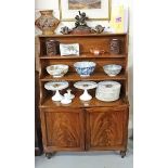 A 19TH CENTURY MAHOGANY OPEN WATERFALL BOOKCASE, 
the upper section with three shelves,