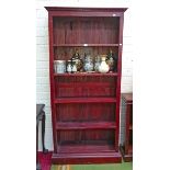 A FIVE TIER OPEN MAHOGANY BOOKCASE, 
on moulded plinth base,