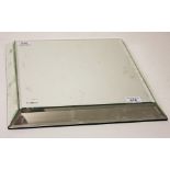 A SQUARE MIRROR TABLE PLATEAU, 
with bevelled edges and flared base, 15in (38cm).