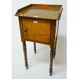 A LATE WILLIAM IV MAHOGANY BEDSIDE POT CUPBOARD, with three quarter gallery and cupboard door,