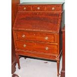 A SLOPE FRONT INLAID AND ROSEWOOD BANDED MAHOGANY BUREAU, early 20th century,