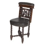 A VICTORIAN CARVED OAK COCK FIGHTING OR OCCASIONAL CHAIR, 
with hinged and padded top,