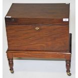 A WILLIAM IV MAHOGANY TEAPOY OR CELLARETTE, 
of rectangular form with hinged top,