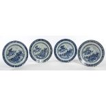A SET OF FOUR LATE 18TH CENTURY CHINESE BLUE AND WHITE BOWLS, 
each decorated with river landscape,