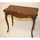 A LATE VICTORIAN ROSEWOOD TELESCOPIC ACTION FOLD OVER ROSEWOOD CARD TABLE,