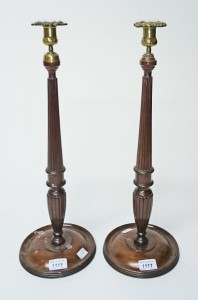 A PAIR OF MAHOGANY BRASS MOUNTED CANDLESTICKS, 
in the Georgian style, - Image 2 of 2