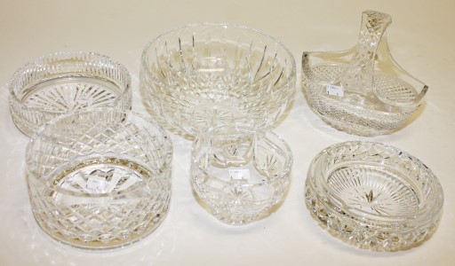 A LARGE WATERFORD CRYSTAL ASHTRAY, 
7in (18cm); another heavier ditto; a Kilkenny crystal basket, 7.