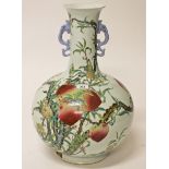 A LARGE CHINESE BULBOUS PORCELAIN VASE, 
with two dragon handles,