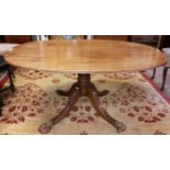 A REGENCY PERIOD OVAL FLIP TOP MAHOGANY BREAKFAST TABLE,