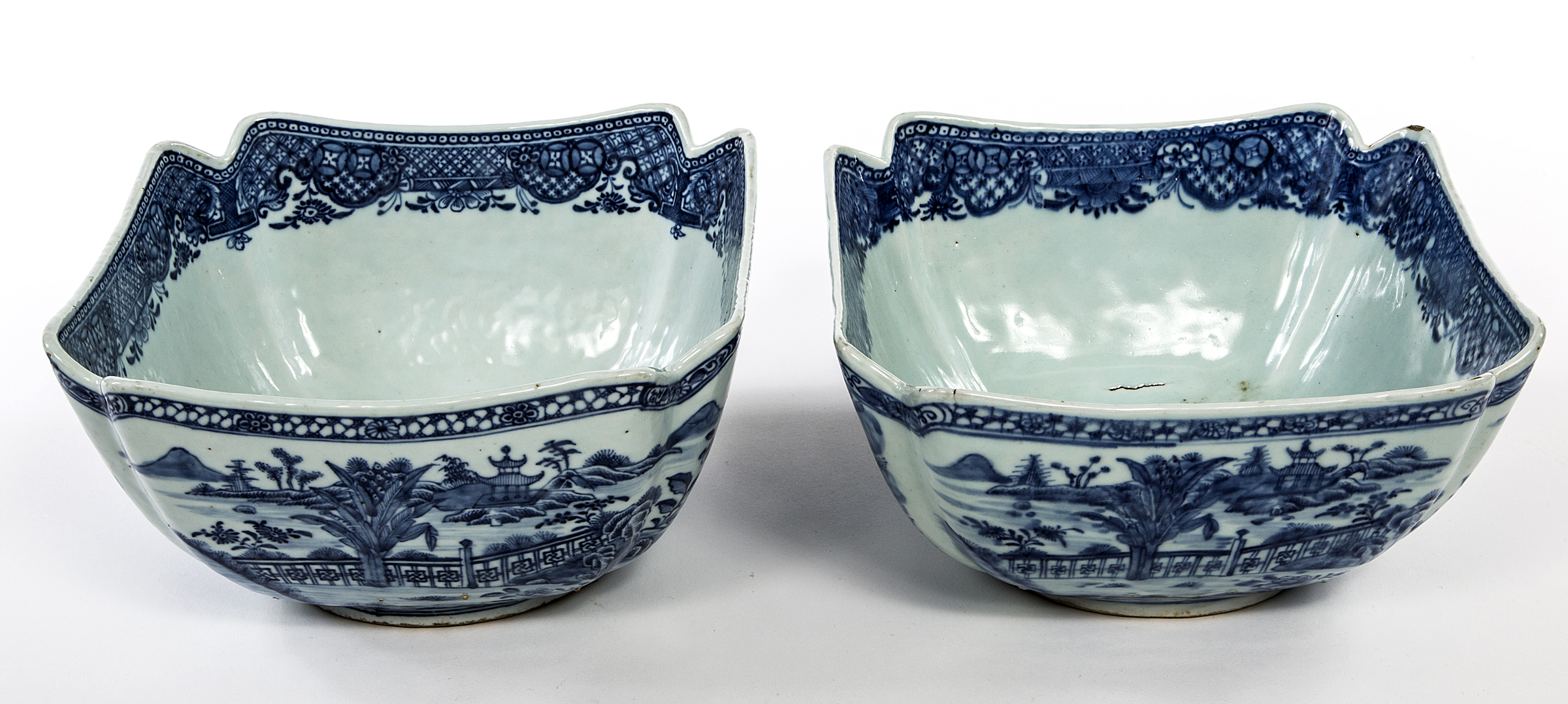 A PAIR OF NANKING BLUE AND WHITE CHINESE BOWLS, 
C.1800, each of square tapering form 9.5in (24cm).