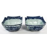 A PAIR OF NANKING BLUE AND WHITE CHINESE BOWLS, 
C.1800, each of square tapering form 9.5in (24cm).