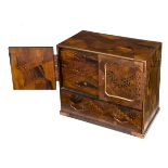 A JAPANESE PARQUETRY INLAID TABLE CUPBOARD, 
with gilt metal strap work and mounts,