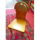 A PAIR OF LATE VICTORIAN MAHOGANY SHIELD BACK CRESTED HALL CHAIRS,