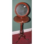 A VICTORIAN MAHOGANY VANITY OR SHAVING STAND, with circular telescopic mirror,