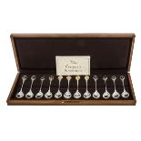A CASED SET OF TWELVE COMMEMORATION SILVER AND SILVER GILT TEA SPOONS, 
R.S.P.B.