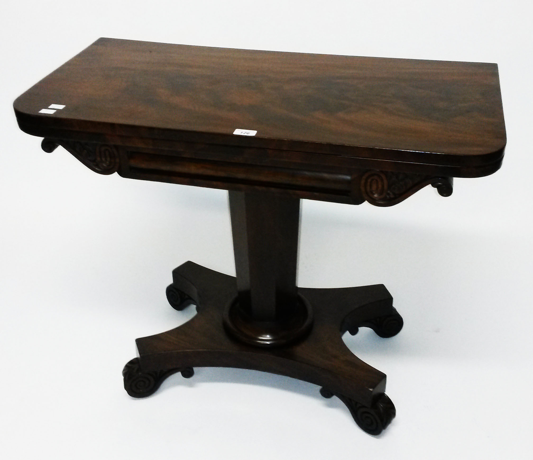 A WILLIAM IV PERIOD MAHOGANY FOLD OVER CARD TABLE, 
the top with rounded corners,