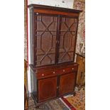 AN EDWARDIAN INLAID AND CROSS BANDED MAHOGANY BOOKCASE, 
with Greek key moulded cornice,