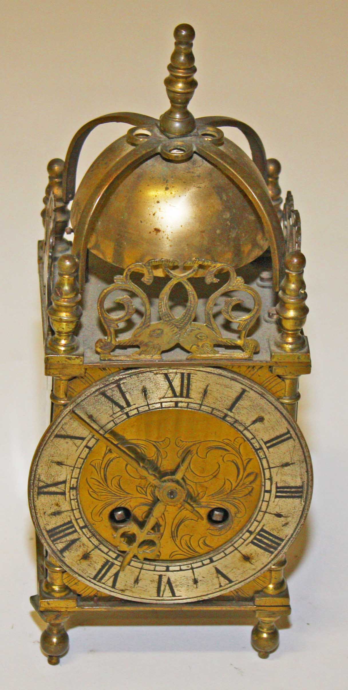 A HEAVY FRENCH BRASS LANTERN CLOCK, 
with lever movement, striking on a brass bell,