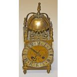 A HEAVY FRENCH BRASS LANTERN CLOCK, 
with lever movement, striking on a brass bell,