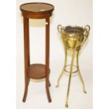A TWO TIER CIRCULAR MAHOGANY JARDINIERE STAND, 
raised on shaped square legs, 37.