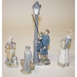 AN ATTRACTIVE LLADRO GROUP, 
modelled as the street lantern lighter, 18.