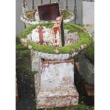 A SET OF FOUR HEAVY ANTIQUE CAST IRON GARDEN URNS,