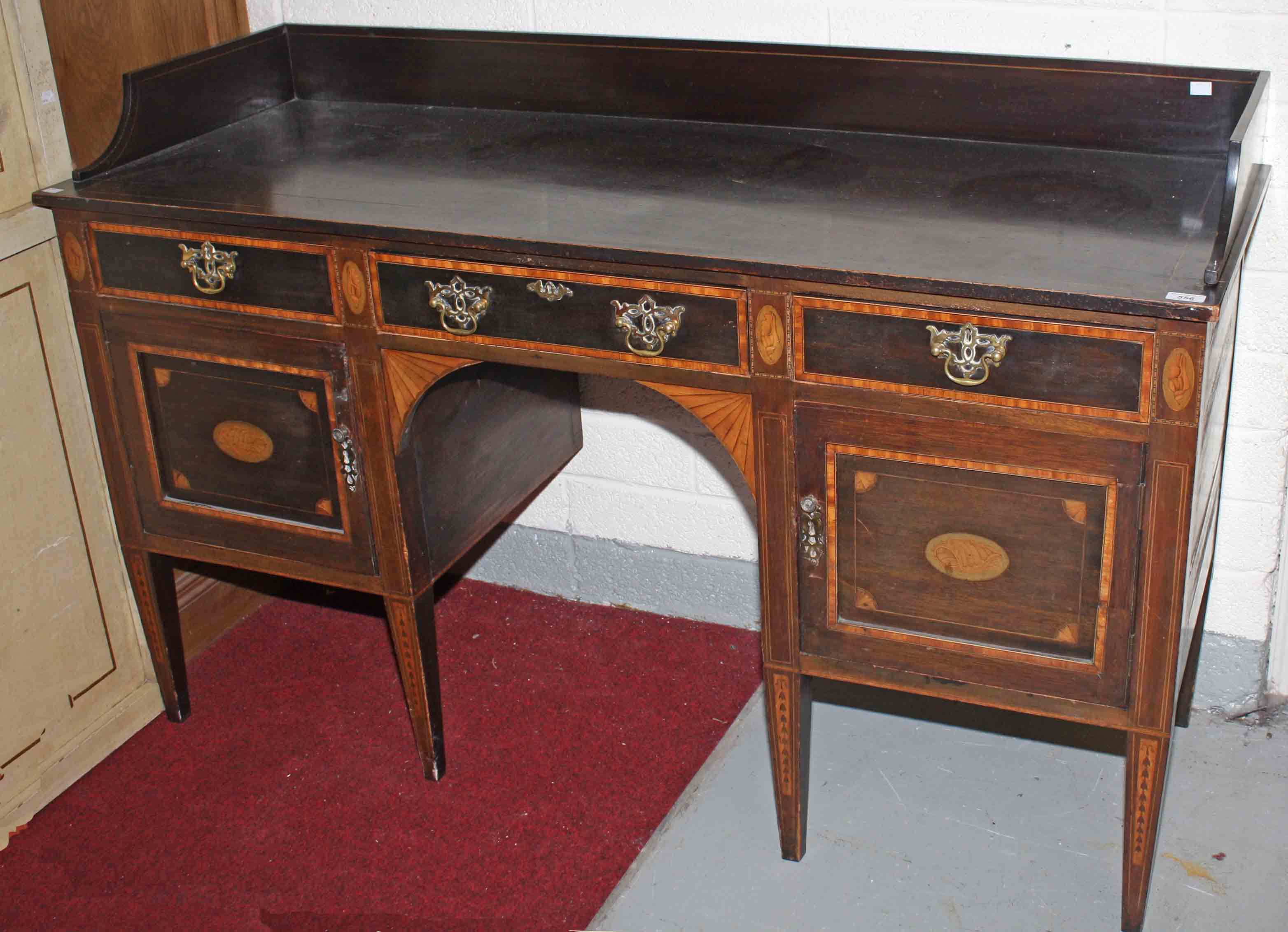 AN INLAID MAHOGANY SIDE BOARD, 
late 19th century in the George III style,